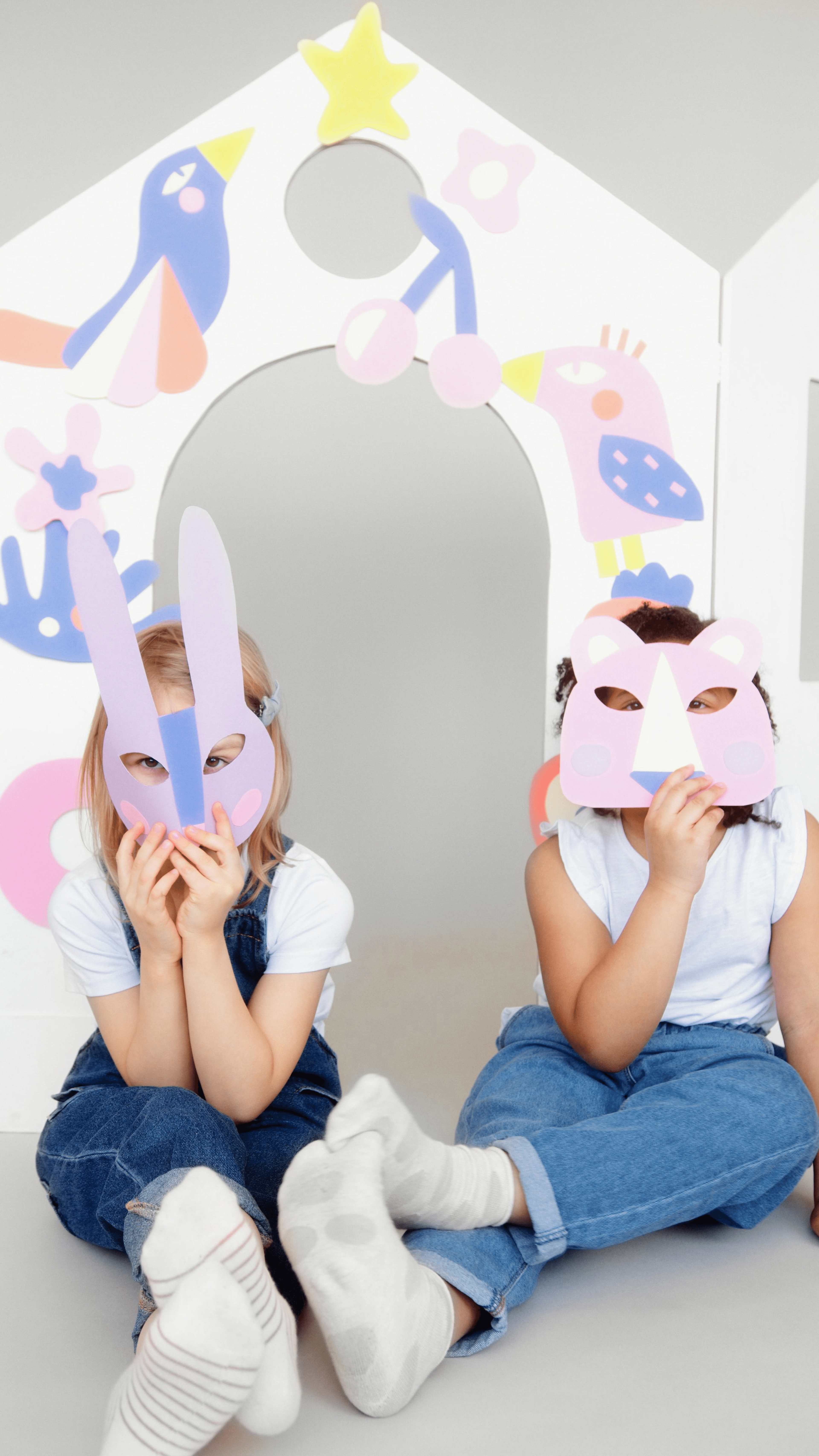 2 Children with cutout masks